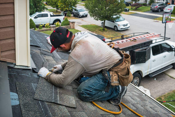 Professional Flat Roof Repair technician working in Norwood, MA
